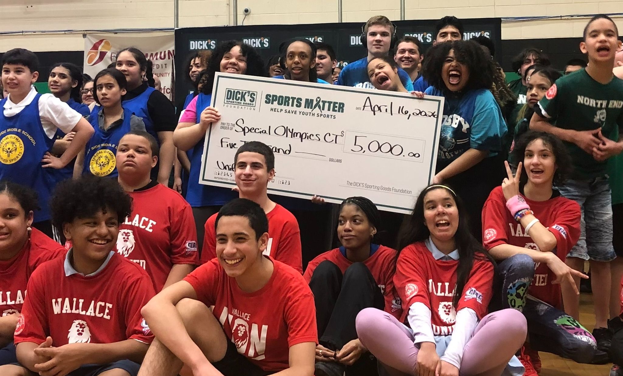 Dick's students with check tight.jpeg