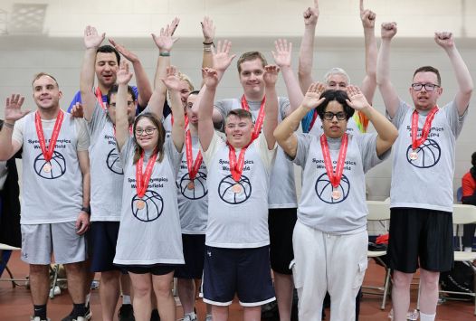 Athletes celebrating medal achievement