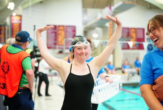 26USAGames Alexandra Frumin arms up at pool.JPG