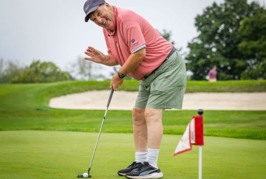 Golf athlete waving