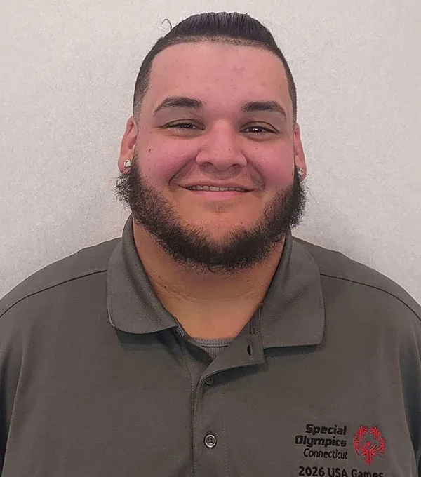 Bryan Carambot headshot in polo crop.jpg