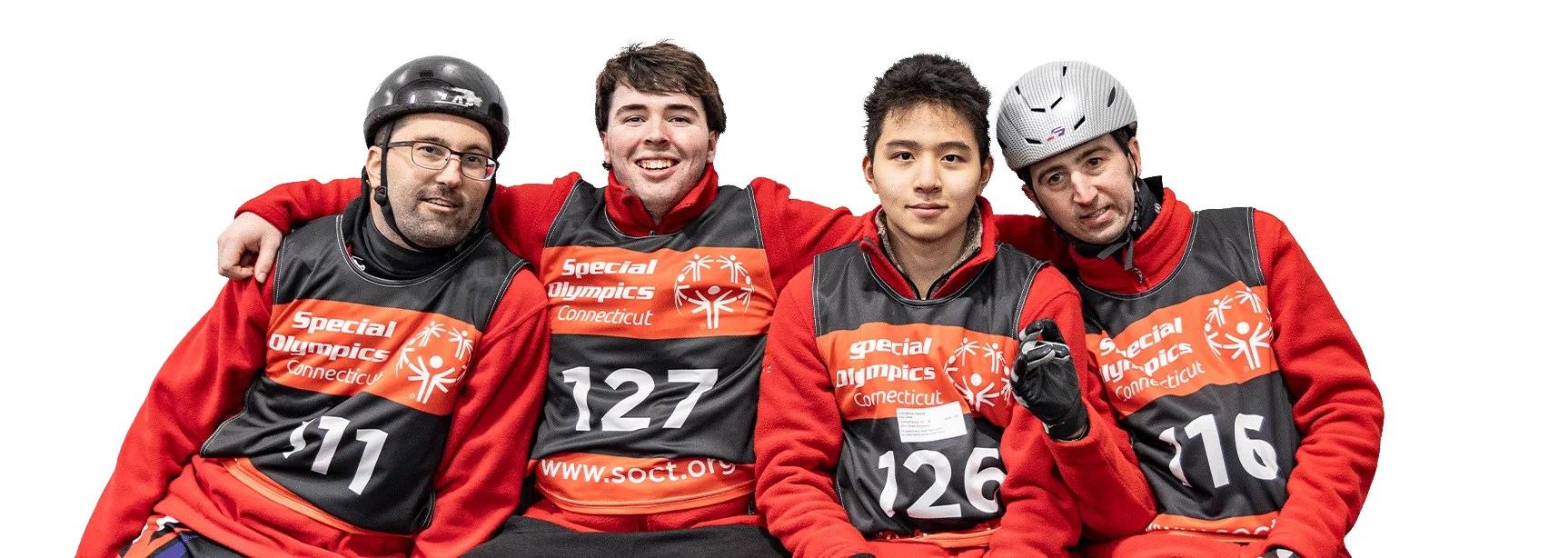 Two male athletes standing together smiling wearing neon tank tops.