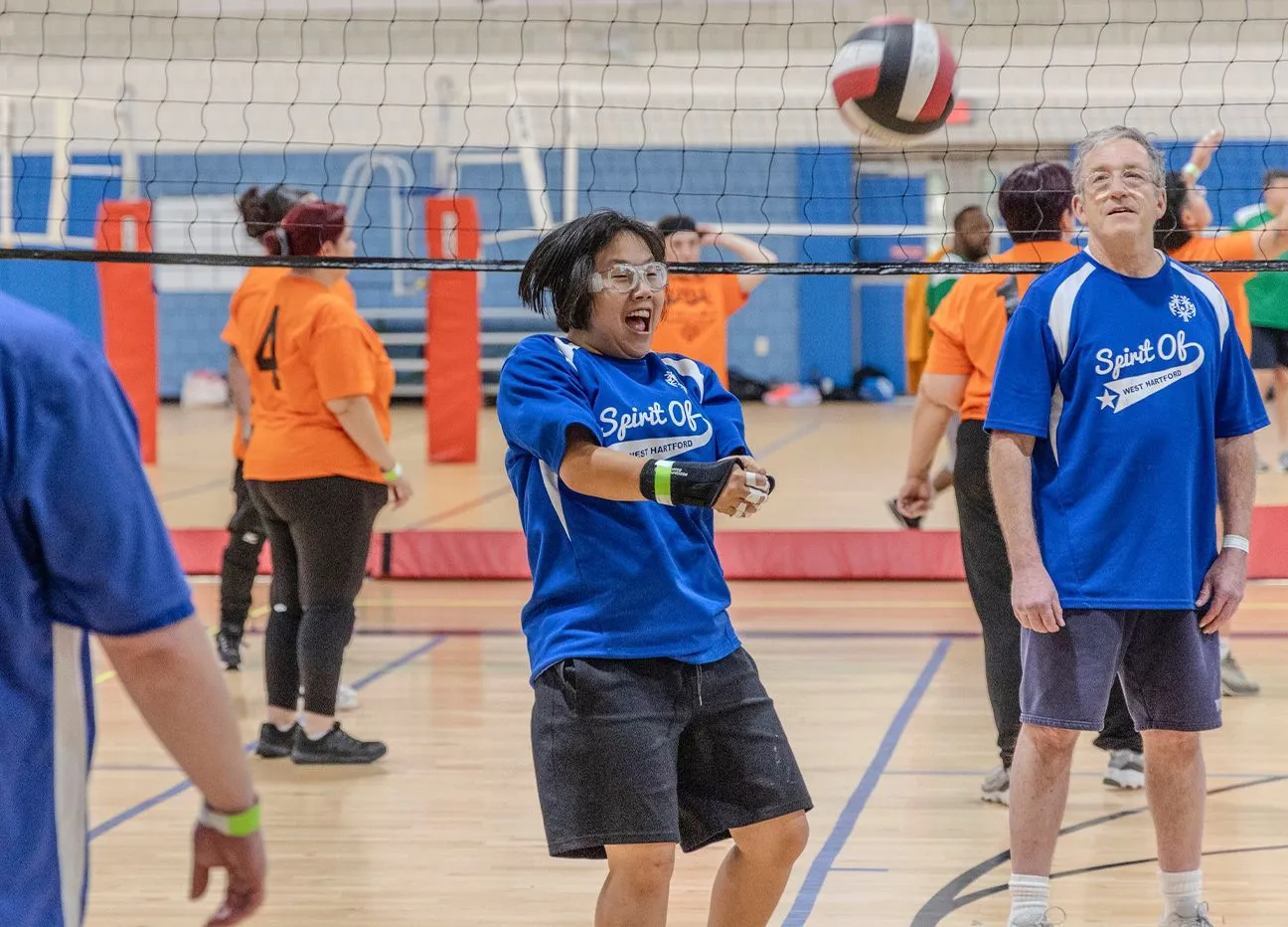 Athletes warming up at volleyball game